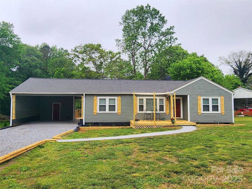 305k!!! Gleaming for all to appreciate, this expansive 0.41-acre corner lot with outdoor living area features a new front porch complete with sun-sail shades & thoughtfully designed landscaping. This spacious lot is perfect for enjoying evenings around the firepit or playing catch in the backyard. The oversized carport with storage leads to a new rear deck. Revel in the stunning, brand-new, maintenance-free vinyl siding and custom shutters. Inside, you'll be impressed by the beautifully refinished hardwood floors, freshly painted interiors, and remodeled kitchen and bathrooms. The primary suite boasts a luxurious multi-head spa shower experience! Conveniently located within walking distance of the vibrant Downtown Mt. Holly, which offers a variety of restaurants, shops, & coffee spots. Plus, the Mt. Holly Swim/Racquet Club, parks, & walking trails are all nearby.