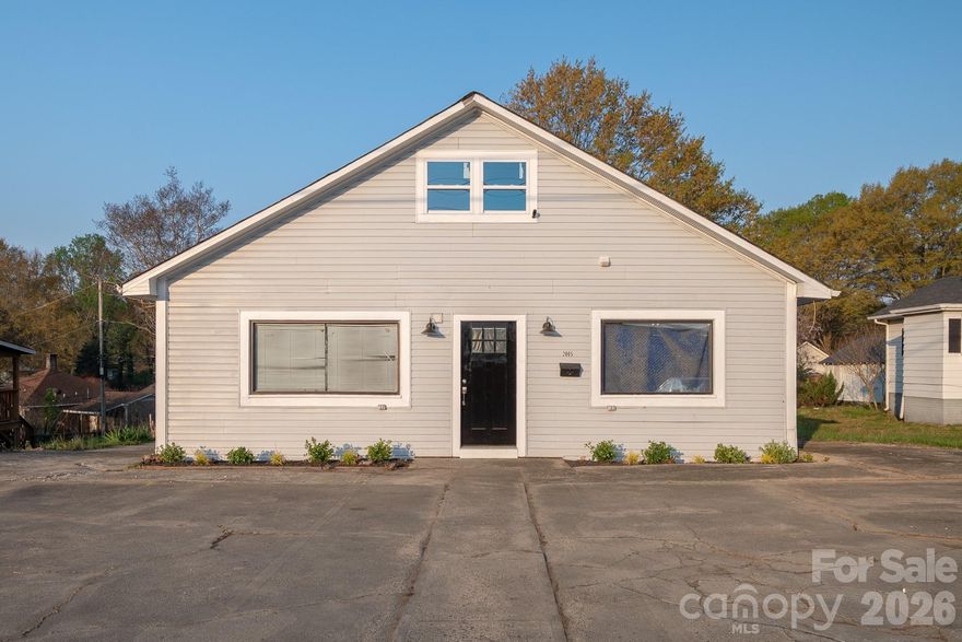 RARE OWNER-USER OPPORTUNITY on the high-traffic Hwy 321 corridor (18,000+ VPD)! Stop paying rent and build equity in this professionally engineered 2,021 SF commercial office shell. This is NOT a standard "fixer-upper"—it is a de-risked, development-ready asset with all major structural and system hurdles already cleared. Clean Shell / Development Ready
The property features a spacious 1,521 SF main floor with a soaring open-concept layout, complemented by a BRAND NEW 500 SF loft/mezzanine addition—perfect for a private executive suite or high-end conference level.

Major Upgrades Completed (2022-2024):

Systems: Electrical and Plumbing rough-ins SUCCESSFULLY PASSED Gaston County inspections (Sept 2022).

Exterior: New high-efficiency commercial-grade windows, and fresh exterior paint.

Interior: Gutted to the studs, HVAC ducting in place, and ready for your custom finish-out.

Strategic Advantages:

Zoning: C-1 (Neighborhood Commercial) allows for professional office, medical, or creative studio use.

Visibility: Massive branding potential with monument signage opportunities on a primary Gastonia artery.

Minutes from I-85 and Gastonia’s urban core. Why lease a 2,000 SF suite for $3,800/mo when you can own this headquarters for a projected mortgage of ~$2,225/mo? Secure your business's future today.