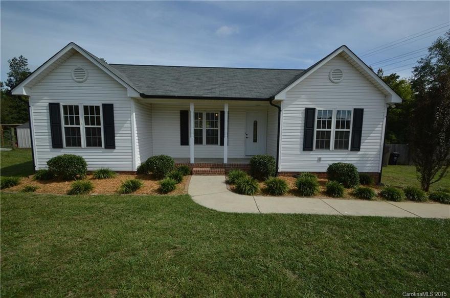 Country Living!  Charming 3 Bedroom 2 Bath Ranch Home with Master Suite Split from Secondary Bedrooms.  Open Floor Plan.  New Laminate Flooring in Great Room, New Carpeting in Bedrooms.  Stainless Appliances in Kitchen.  Enjoy the Large Deck that overlooks a Huge Fenced Yard - Lot is over One Half Acre.