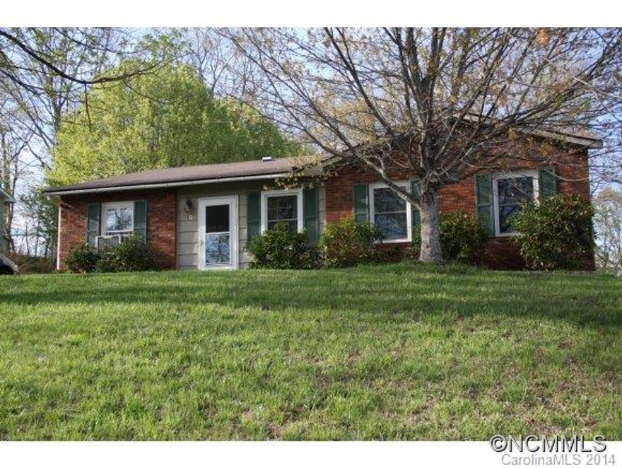 Well-maintained one level, 4 bedroom, 1 1/2 bath home. Open living space, hardwood floors, and brand new windows! Private level backyard on a .26 acre lot. Super convenient to Asheville with county taxes. Move in ready! Eligible for 100% USDA financing.