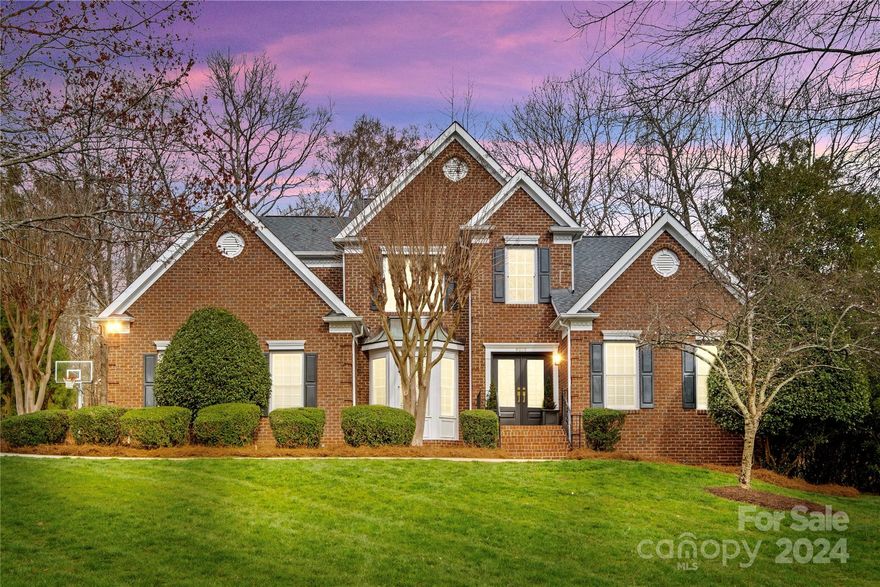 Located in desirable Preserve at Belingrath, updated, move-in ready 2 story brick home features 4 beds, 2 full & 1 half baths, 2 car garage & 3,039 sq ft. Main level features refinished hardwood floors, renovated kitchen w/ bright cabinets, quartz counters, SS appl & laundry rm, home office/living room w/ French doors, dining/play rm & two-story great rm w/ fireplace. Oversized primary suite w/ sitting area, walk-in closet & beautifully renovated primary bath w/ dual vanities, oversized shower, soaking tub & water closet. Incredible indoor/outdoor living w/ new paver stone patio & firepit overlooking usable fenced backyard. Upper level features 3 beds, renovated full bath & walk-in attic storage. Updated features: fresh paint, light fixtures, rear exterior doors (2024), front doors (2022), roof (2021) & more. Located w/in minutes of Mountainbrook & Beverly Woods East Clubs, in heart of S CLT w/ highly rated schools, accessible to SouthPark, Uptown, CLT airport & more. A must see home!