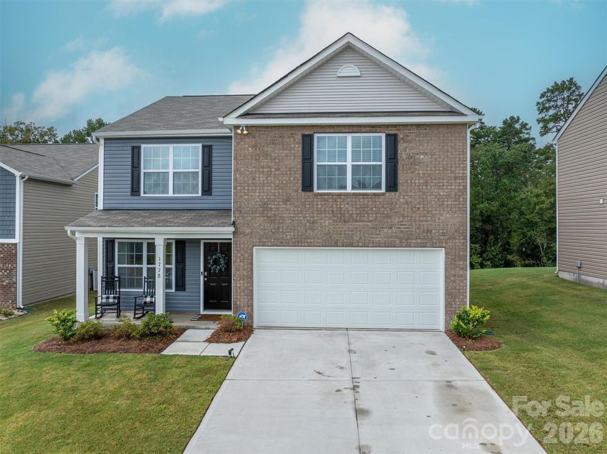 This nearly new home—less than two years old—is move-in ready and waiting for its next family. Located in a beautiful community with a clubhouse and pool, it offers both comfort and convenience. The kitchen stands out with granite countertops, a stylish backsplash, crisp white cabinets, and a spacious pantry. The family room features a cozy fireplace and flows seamlessly into the dining area, creating the perfect space for gathering. With easy access to I-85 and Hwy 321, and just a short drive to Charlotte Douglas Airport, this home combines modern living with an unbeatable location.