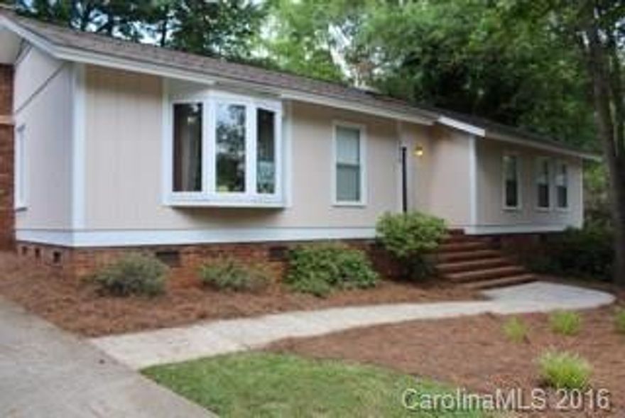 Great property right near the heart of Downtown Matthews. Cul-de-sac lot with almost 1/2 an acre and fenced in back yard.  Cathedral ceilings, back deck and a great view out of your bay window in the dining room give you a quiet, rustic feel while being 5 minutes from shopping, dining, 4 Mile Creek Greenway, Squirrel Lake Park and I-485. A/C replaced approximately 2 years ago. Don't miss out on this great house in a wonderful location!