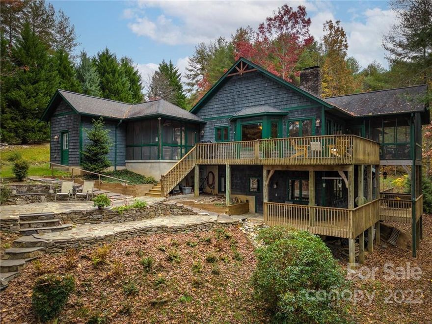 Premier Waterfront Lot on Lake James with easy access to fantastic dock! Well kept Craftsman Adirondack style lakeside cottage tucked in the trees, private and comfortable home at the end of a cul-de-sac in sought after Southpointe! Hardwood floors, two screened porches, wrap-a-round deck, one level living with additional lower level space for guests. Walkable to community swimming pool, clubhouse and marina. Two dry stack rock woodburning fireplaces (plumbed for gas) with tons of natural light and fantastic outdoor space for year round enjoyment of all the things Lake James has to offer. Minutes to Morganton restaurants, shops and conveniences. Southpointe offers public water, sewer and high speed internet. Come see what others have found, beautiful Southpointe Lake living!