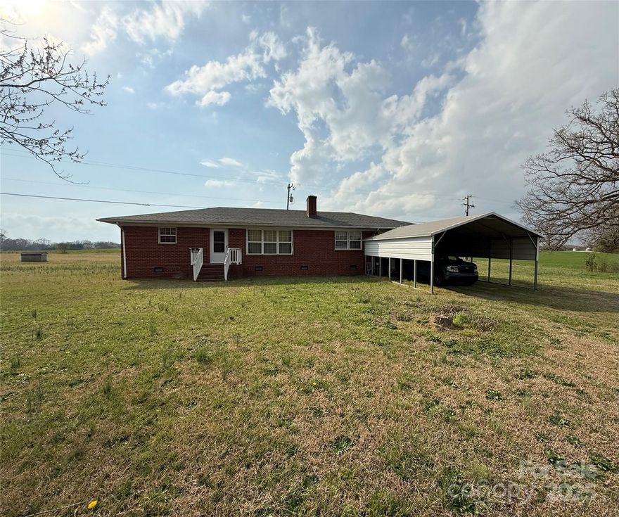 PRICE REDUCTION, 3 Bedroom 1 Barth ranch home on large corner lot. TLC and Updating needed. Convenient location to Monroe and HWY 601.