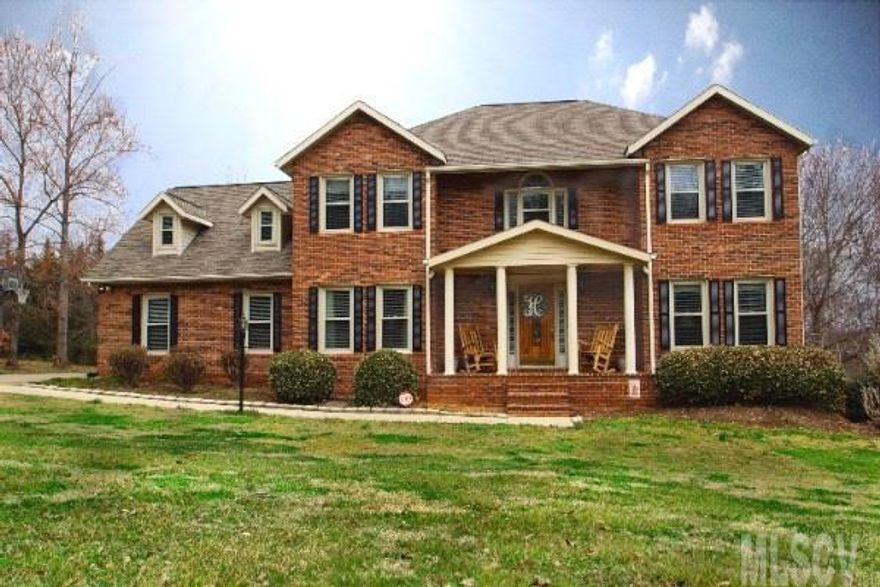 Beautiful porch columns and charming dormers blend with front facing gables giving this country traditional house plan an inviting look. Its floor plan delivers the perfect family home for those who want large spacious living. Entering, the peaceful study and dining room flank the entry, a living room with built-in bookshelves surrounding an elegant fireplace. Outdoor lovers and grill masters will appreciate the covered and screened deck, extending the living areas outdoors. The island kitchen is large and inviting boasting a snack bar, pantry and planning desk while remaining visually open. Four bedrooms serve the family’s needs, each featuring spacious closets. The two-car, side-entry garage finishes off the left side of the home. The master suite’s luxurious space is well-appointed showcasing large windows, closets, and luxurious bath outfitted with twin vanities, a garden tub, and roomy shower. Filled with everything you’ll love and nothing you won’t want, second to none!