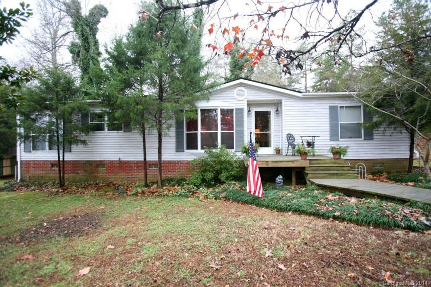 This home shows like a model.   Great condition and upgrades.   The outdoor area is beautifully landscaped with a fish pond, decking and fire pit area.   Separate Building with Work Shop and Electric already in place.  Yard is totally fenced with plenty of room for the kids or puppies.   This is a must see.