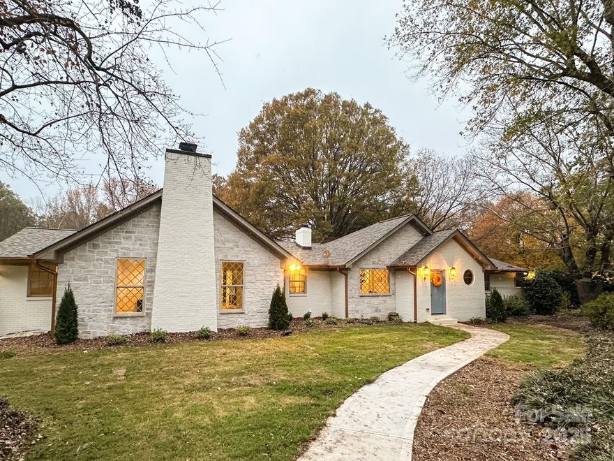 Gorgeous, newly remodeled single level home in the perfect location. 5 spacious bedrooms, 3 full bathrooms. Immaculate primary ensuite with its own wood burning fireplace, cathedral ceiling, huge walk-in closet with custom shelving, and a large private bathroom. Freestanding tub, walk-through double shower, and double vanity with a separate water closet. A beautiful brand new custom kitchen with its own secret back pantry hidden behind cabinetry. 36" gas range. On demand hot water heater. Brand new vac system. 2 brand new bathrooms for the additional 3 bedrooms on the other side of the home. A huge 380 sq ft deck coming off the back of the home. Romantic French doors off the dining room. Large laundry room with ample cabinet storage and a custom built drop zone off the back entry of the house. The perks of a "new" house but with mature vegetation and landscaping, providing ample privacy in the back.