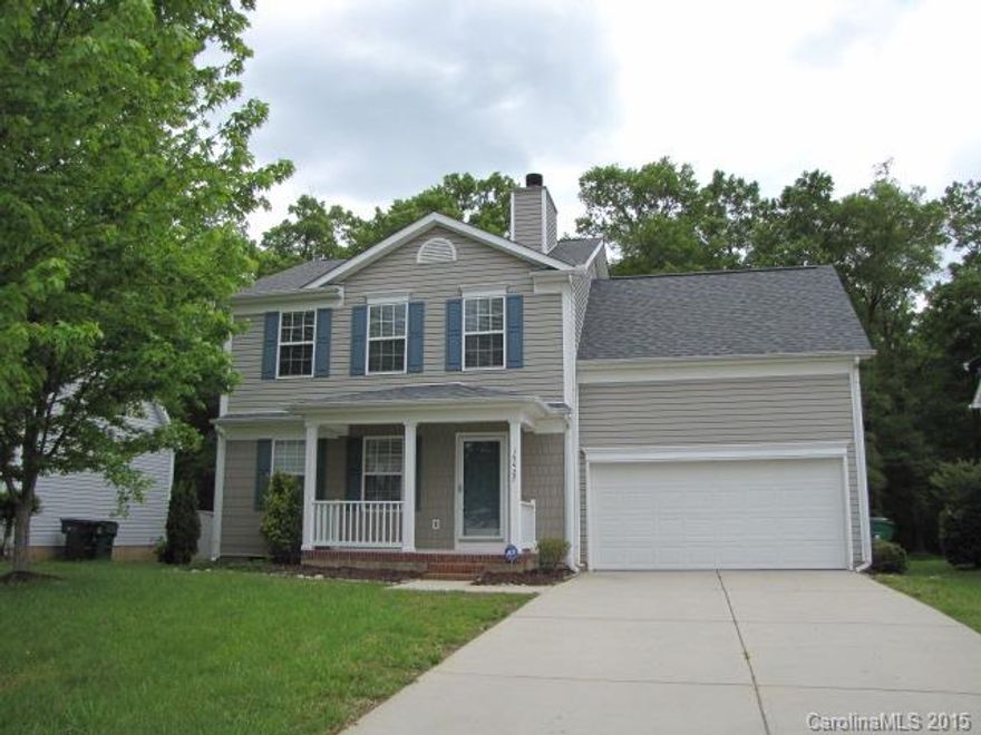 Two-story traditional w/rocking chair front porch! Crisp & clean laminate wood flooring in living room w/ fireplace & mantle. Kitchen includes standard appliances, center island & sunny breakfast area. Sliding glass doors lead out to awesome deck overlooking backyard. Bedrooms are upstairs & spacious. Master suite includes vaulted ceiling & fan in the bedroom, nice size bathroom & walk-in closet w/built-in shelving. Community amenities include clubhouse, playground, swimming pool.