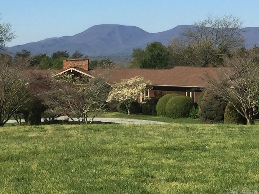 Amazing views & 20.99 acres in the heart of Tryon Horse Country!  Established pasture ready to fence.  Large bank barn for stalls or workshop. House was custom designed for this site and has impressive views from all living spaces. Cathedral ceiling living room w/fireplace. Huge Master suite with two walk in closets, large kitchen, dining room, 2 car garage. 3 Full baths, 2 bedrooms, & library/sitting room holds sleeper sofa. In ground pool. Surrounded by horse farms and FETA trail system.