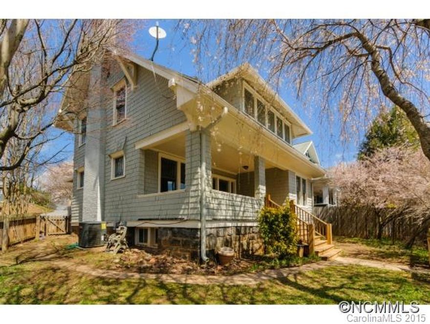 On the corner of happiness and historic charm, this home is tastefully updated and freshly painted awaiting a new family to hold. Steps from downtown in the 5 points neighborhood is a hard to find 1900+sft home with coffered ceilings, pocket doors and tudor-style window details. Large open kitchen with granite and stainless appliances, 2 large bedrooms with master bath and small 3rd bedroom make living easy in this downtown view home.