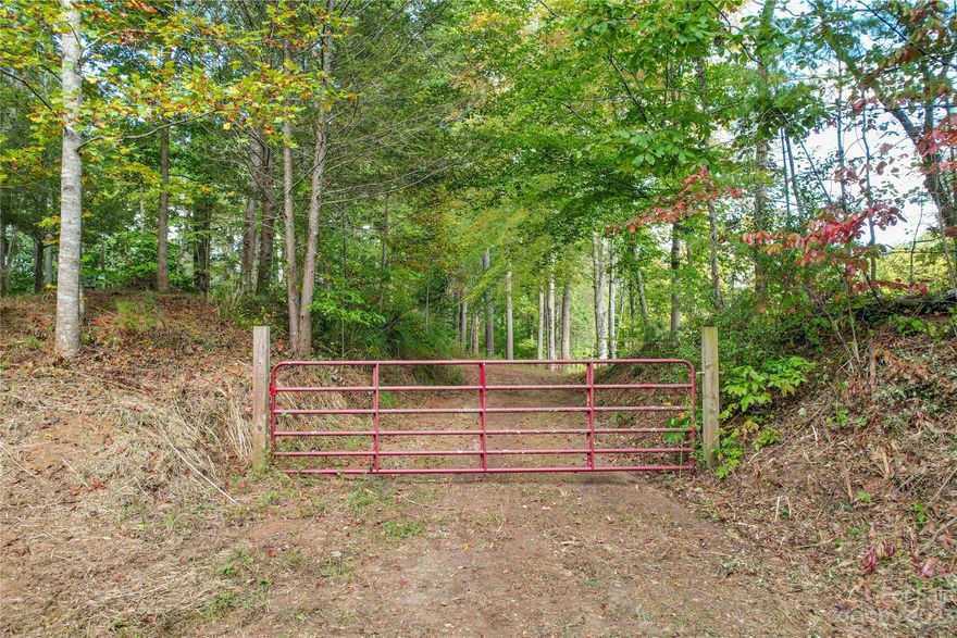 WOW! Hard to come by, REALLY nice private 3.23 acres approx. 7 minutes north of downtown Weaverville and only 5 minutes from I26.  Lovely, secluded, wooded, partially cleared, level, gently sloping acres and mountain views especially with some tree removal.  No restrictions found.  Possibly 2 - 3 building sites.  Buyer to confirm with Buncombe County.  There is a 2 bedroom septic (no record found) and a well on the property (tag says 08/30/2004, 140', 8 GPM) that was there when seller purchased the property in 2014. Accessed on a charming, private, gravel drive with a 20' right of way that's shared with only one neighboring house.  If you are looking to build in Weaverville, you need to view this property quickly!
