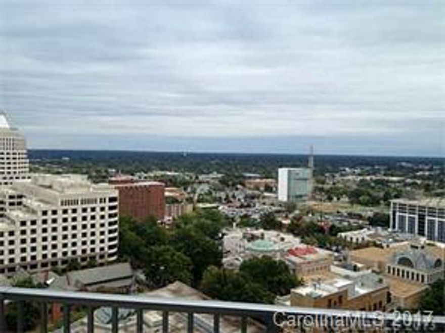 Live in the center of everything! Dark hardwood floors with carpet in the living room.  Building includes concierge, pool, fitness center, and business center