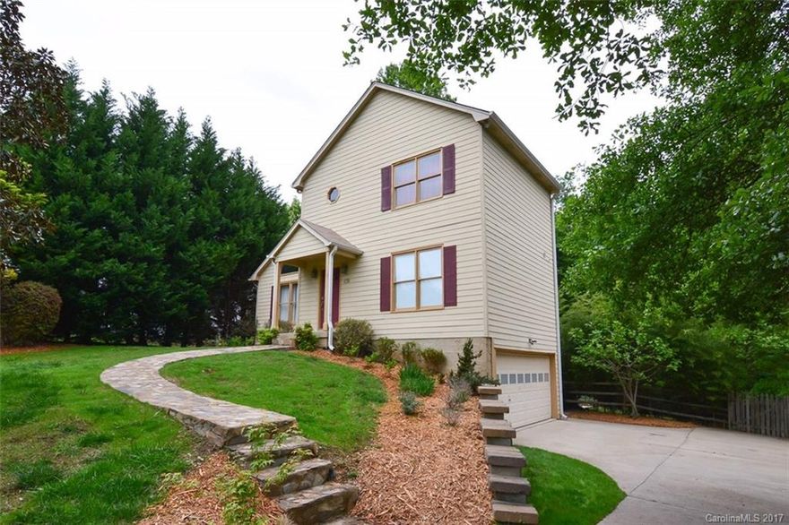 Rare Find in Top Rated Tega Cay/Ft Mill School District! Finished, Walk-Out Basement with Full Bath.New Wood Laminate Floors & New Carpet! Move-In Ready with Granite in Kitchen & SS Appliances.Newer Tankless Gas Water Heater & Roof is 6 years old! Mstr Bedrooms on Upper & Main Level.Office, Laundry & Family room in Basement! Vaulted Great Room with Access to Oversized Deck that boasts a view of Private wooded Lot. Peaceful Neighborhood with Mature Trees. Fenced Back Yard has limitless Potential!