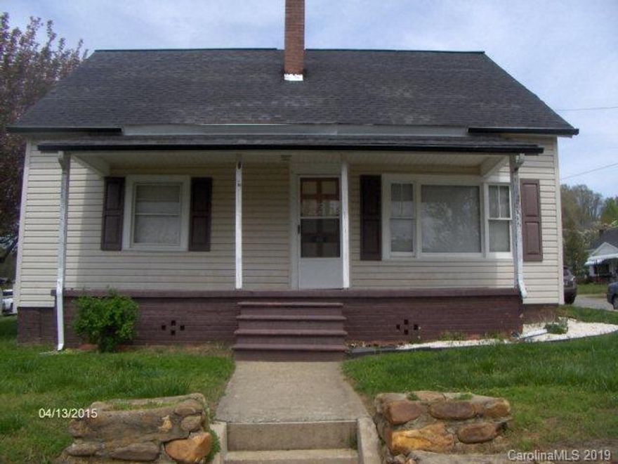 Really nice, comfy, older home located close in to town and schools. This is a well built home as it has stood the test of time. Three large bedrooms with original hardwood floors economically heated and cooled with a newer heat pump. City water and sewer so you don't have to worry about problems with either of them. You also have a nice laundry room and single carport. This is located on a corner lot with low traffic flow. Take a look at home affordability in this one!