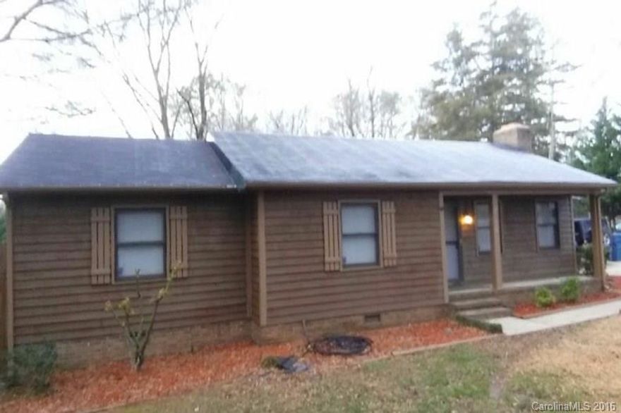 Welcome home to this cute cedar sided bungalow. Home features open floor plan with hardwood flooring in the dining area and family room with a cozy wood burning masonry fireplace. Kitchen has solid surface counter tops. Master bath has newly tiled shower. Fixtures updated. New carpet in bedrooms. Fresh paint throughout interior/exterior and just installed a new roof with a 25 year warranty. Large back deck to enjoy the huge back yard that has privacy fencing and  a 1 car wired garage workshop.