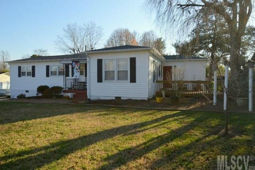 This beautiful home is very well maintained! You will find gorgeous hardwood floors throughout the home. Both bathrooms have attractive tile flooring. The kitchen has newer stainless appliances, solid surface countertops and ample cabinetry. The master suite has a en suite bathroom and a very spacious walk-in closet. There are two decks, a detached double carport, a detached 363 sq. ft. metal garage, and a 225 sq. ft. outbuilding. Both the garage and outbuilding are wired. There is a great fenced garden space in the backyard, as well as a privacy fence and fire pit. This home is adorable and charming! Quite possibly the nicest home on the market in this price range. You will not be disappointed!  It is a pleasure to show and won't last long!