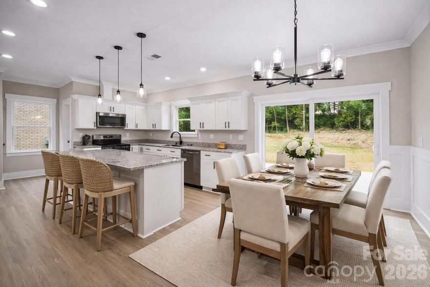 Brick new construction home with upgrades + private wooded lot under $300K—rare find in Albemarle.| USDA Eligible |  
This 3-bedroom, 2.5-bath home combines low-maintenance durability with modern upgrades and an open, functional layout designed for everyday living. The main level features a bright, open-concept living space with detailed moldings, a spacious kitchen with center island, and seamless flow for entertaining.
Upstairs, the primary suite offers a private retreat with a walk-in closet and en-suite bath, while two additional bedrooms provide flexibility for guests, a home office, or growing needs.
Set on a generously sized lot that extends into the tree line, this property offers added privacy and room to enjoy the outdoors—something buyers consistently struggle to find in newer homes. Property line extends into the tree line, property is marked.
Located just minutes from downtown Albemarle, with convenient access to shopping, dining, Stanly Community College, and an easy drive to Charlotte. Outdoor recreation is right at your fingertips with Badin Lake, Lake Tillery, and Morrow Mountain State Park nearby.