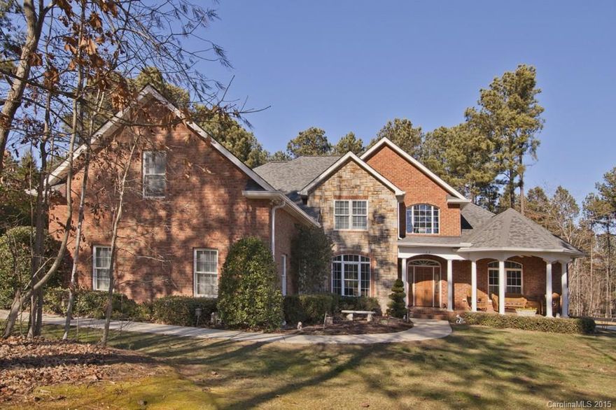 Immaculate, full brick 4 bedroom, 3 bath home with deeded boat slip 19 in desirable Shavender's Bluff! A quick stroll down to community docks, sandy beach, and swimming pool! Master suite and secondary bedroom on the main level. Upstairs has a large bonus room and 2 bedrooms that share a Jack and Jill bath. The house is situated on a very private cul de sac lot. Oversized 2 garage, Culligan water filtration system, generator hook up, and humidifier for HVAC. Dry storage for boats in community!