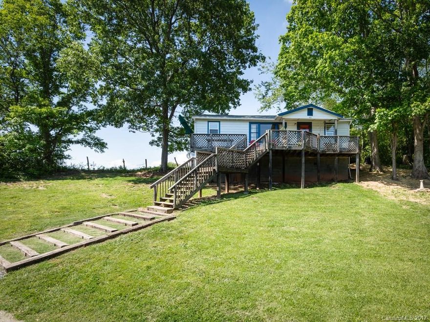 Precious cottage on a hill, beautiful rural setting complete with cows! This 1962 Jim Walter kit home w/all the basics makes excellent starter home or investment. Currently a successful Airbnb vacation rental, information available upon request. NOTE:HOME IS IN NEED OF A NEW FOUNDATION, priced accordingly. *DO NOT DISTURB, limited showing times, call Showing service