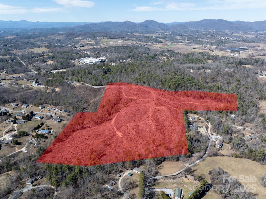 This exceptional 33.6-acre tract of land, a combination of 4.92 acres and 28.68 acres, offers a prime opportunity for development or the creation of a stunning private estate. With its long-range mountain views and gently sloping terrain, this property provides both breathtaking scenery and practical usability. The land has already been cleared, making it ready for immediate use while still allowing for thoughtful landscaping and customization. Whether you envision a luxury mountain retreat, a multi-home development, or a peaceful homestead, this versatile property delivers the perfect balance of privacy, accessibility, and natural beauty.