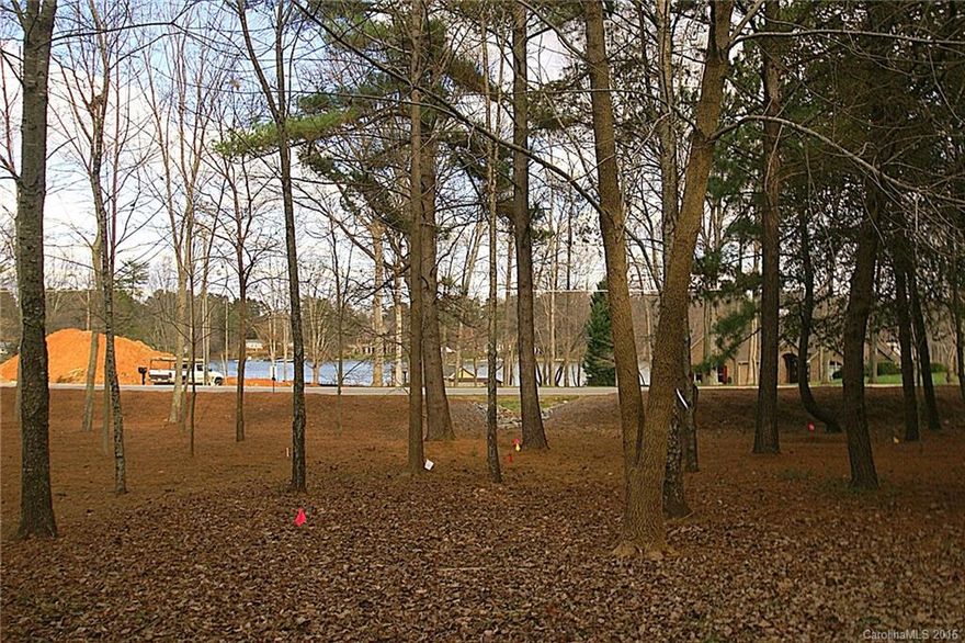 Water view Lot in the quaint gated Sconset Village section of The Point / Trump National Golf Course.  No time limit to build, the builder must be approved by Crescent Resources. Marketing fee is required to be paid to Crescent at closing on new builds.  Septic perks for 4 bedroom home.