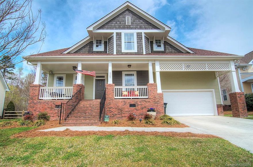 Shows like a model! New exterior paint. Open floor plan. Great room with vaulted ceiling & fireplace. Master on main. Large bedrooms on upper level with bed/bonus. Pool table can convey. Kitchen with brand new ss appliances. Lots of cabinet space with pull out drawers. Master bath has dual vanities, garden tub, separate shower & linen closet. Walk in attic storage. Patio with custom fire pit and outdoor speakers. Fenced back yard. Tega Cay amenities-golf, tennis, trails, lake. Fort Mill Schools.