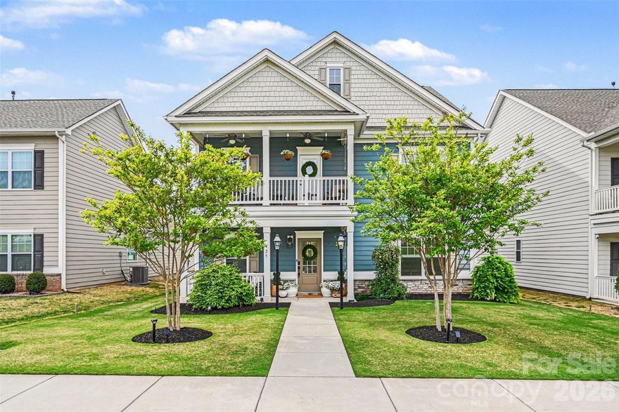 Discover this stunning home in the heart of Locust Town Center.  This home feels better than new and is absolutely immaculate inside and out. Don't miss the upgraded landscaping and exterior lighting, including gas lanterns and trim lights.  Floorplan offers an open, airy design for modern living, featuring a huge kitchen that flows seamlessly into the living area. This creates an ideal space for gatherings and everyday comfort. The massive dining room is perfect for special occasion or casual dining.  Seller has made thoughtful upgrades of $48K+ to elevate every corner of the home, including an enhanced outdoor covered patio, complete with a relaxing hot tub - your own private retreat after a long day, upgraded indoor lighting, EV charger, gas connection for a generator, and so much more! Upstairs a versatile loft opens to a covered balcony porch, perfect for morning coffee or unwinding in the evening. Set within a pedestrian-friendly community, this home blends convenience with the charm of small-town living.  Enjoy local shops, dining and the welcoming atmosphere that makes Locust Town Center so special.