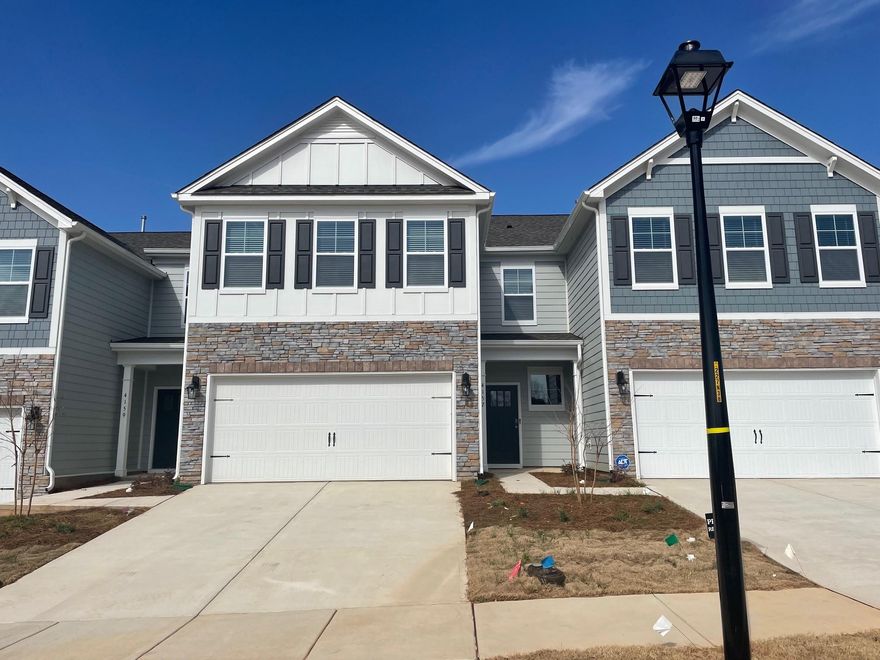 READY FOR IMMEDIATE OCCUPANCY!
Sparkling NEW Move in Ready Townhome with over 2500 sq. ft. and a 2 car garage! This home features an open floor plan with a large kitchen that features a gas oven, SS appliances and granite countertops. Spacious family room opens to a dining area. The main level also offers a bedroom and full bath as well as a laundry drop zone. The upper level is home to the large primary BR and adjoining luxury bath as well as 2 additional bedrooms, another full bath and a loft. New community in the rapidly growing Sherrills Ford area is convenient to local restaurants and shopping as well as Lake Norman. Neighborhood has a pool and dog park. Pets considered on a case by case basis.