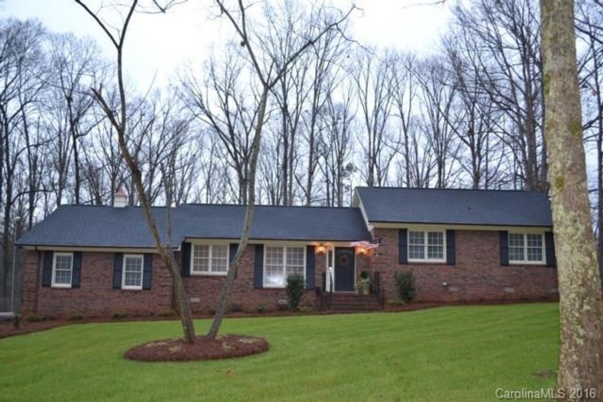 Prepare to be impressed the minute you turn into the driveway!  Immaculate yard with full irrigation, fenced backyard, attached double garage and a detached single garage/workshop.  When you open the front door you will see that the house has been completely remodeled!  Huge formal living room and dining room, updated granite kitchen with stainless appliances, tile backsplash, gas range. Great room has a fireplace/gas logs. Screen porch, hardwood floors throughout!