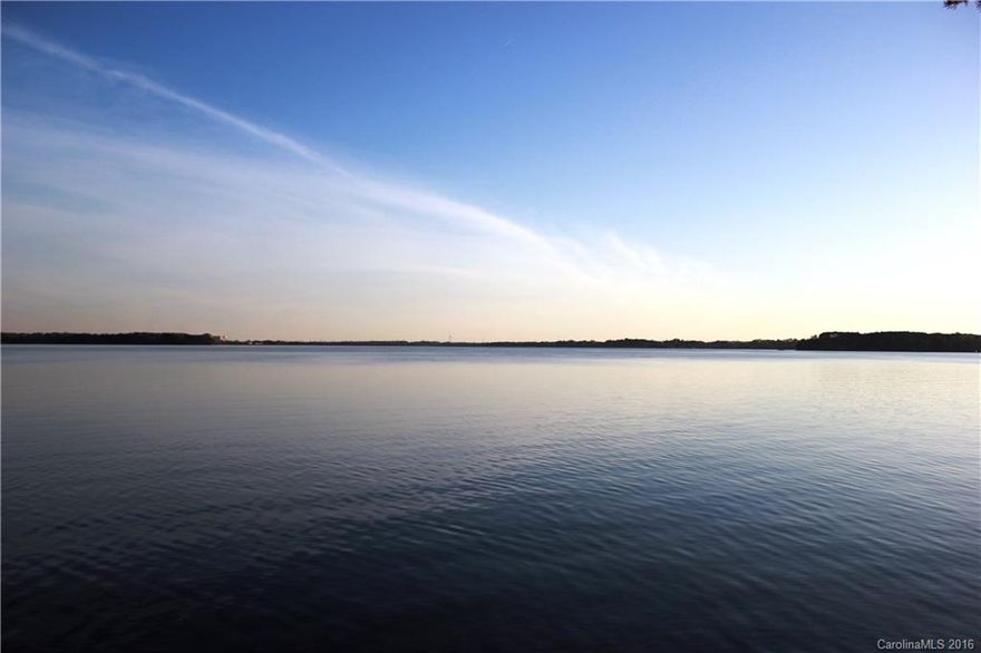 Possibly the BEST buildable lot left on Lake Norman! Breathtaking main channel views surround this picturesque, peninsula/cul-de-sac lot in the coveted neighborhood of The Peninsula. At just under an acre and nearly 350 ft of shoreline, this property awaits your Lake Norman dream home.