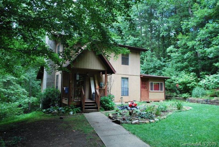 Nebo area-Well maintained 3 bedroom, 2 bath two story home on a .46+/- acre lot.  This home offers a living room in addition to a large den w-gas stove, wood floors, walls & ceiling for a unique look.  1 bedroom is on the main floor with the 2 additional bedrooms and a bath on the second.  The home has a newer heat pump and has been wired for generator hook up.  Additionally a storage building, a nicely landscaped yard and woods surrounding the home allow for privacy.  The location is near Lake James, Marion & I-40.