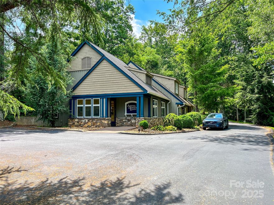 "Animal Hospital East": 1275 Tunnel Road, Asheville, NC 28805. Outstanding investment opportunity anchored by a national veterinary practice ensuring long term stability and income appreciation. 2-level building with veterinary hospital on the ground floor and two walkup apartments on the 2nd floor. Paved on-site parking for 13 vehicles.
**INVESTMENT HIGHLIGHTS**
* Established, 44-year-old veterinary practice with 2 locations for sale (**see also 1304 Hendersonville Rd., Asheville, NC - Animal Hospital South**)
* Dominant pet hospital serving east Asheville
* Prominent signage on Tunnel Rd. (US Hwy 70), a major 4-lane commercial corridor
* Acquired in 2024 by Blue River PetCare, a national veterinary group with over 200 locations in the US
* 2nd floor leased to two apartments
* Blue River PetCare’s commitment to Asheville will ensure a stable, long-term investment for the purchaser