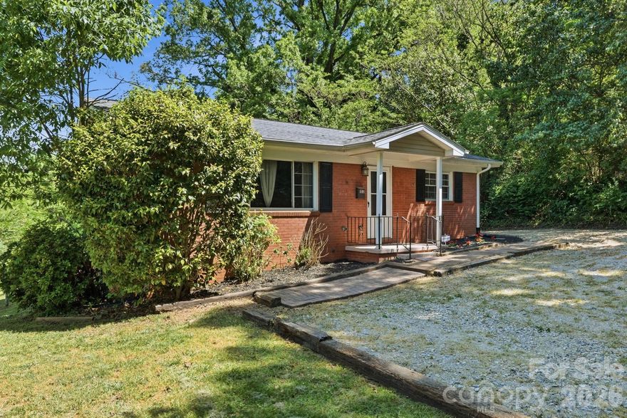 All brick 2 bed, 1 bath home on a spacious 0.38 acre lot just minutes from downtown Concord—offering a rare combination of space, privacy, and value with no HOA. Original hardwood floors run throughout the main living areas, with tile in the kitchen and bath, and an updated kitchen that brings a more modern feel. The layout is simple, functional, and easy to live in, making it a great fit for first-time buyers, downsizers, or investors. Step outside to a large yard with a fire pit, wooded backdrop, and a quiet road setting that adds to the overall privacy—features that are hard to find at this price point. Additional highlights include a crawlspace foundation, vinyl windows, a storage shed, and all appliances included. Located close to Gibson Mill Market, Cabarrus Brewing Company, and downtown Concord’s shops and restaurants, with convenient access to major roads for commuting. Homes with this much land, location, and no HOA don’t come around often.