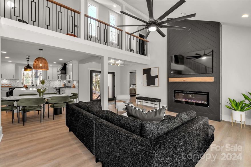 This home was fully remodeled in 2023 with creative design. Every inch of space was carefully thought out to make this home functional and comfortable. From the ground up, starting below the home you find a fully encapsulated crawlspace , up to the New roof, HVAC and new duct work and everything in between. The double glass entry doors create a space of light and welcoming. Your eye immediately catches the accent ceiling. Family room with tons of light, fireplace open to the second story with custom railing. Walk into the amazing kitchen with waterfall edge quartz counters, 36 inch, dual fuel Zline range, with matching Zline Dishwasher and microwave. Primary bedroom on the main level with custom wood accent walls, huge primary closest and primary bath with custom shower w/ built in blue tooth. Upstairs features an additional bedroom and full bath with a loft for multi use and walk in attic storage. Gated community with lake access and golf and country club, private beach, garden, park.