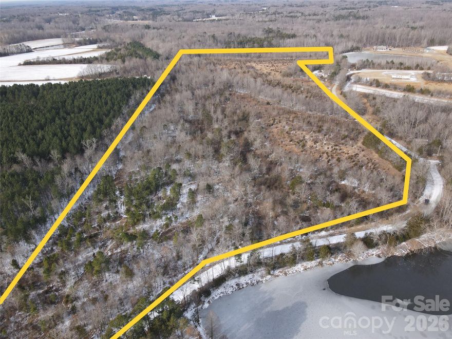 This mid-size vacant land tract in Orange County, North Carolina offers a unique blend of conservation, recreation, and future potential. Approximately 25± acres are protected by a conservation easement, preserving the natural character and providing outstanding habitat and recreational enjoyment. This portion of the property is heavily restricted, including prohibitions on building, access improvements, agriculture and road improvements.  Hunting is allowed.  These restrictions run with the land and can be provided in full detail by the listing agent.   
Several potential build sites exist on the remaining 12+- acres outside of the conservation easement, allowing for thoughtful use while maintaining the integrity of the surrounding land. The property features two hardwood creek bottoms that create natural travel corridors for wildlife, along with abundant deer trails, bedding areas, and visible signs throughout—making it an excellent recreational or hunting tract. High ground within the conservation area supports natural grasses and saplings, adding to the property’s diverse landscape and scenic appeal.
With over 1,500 feet of road frontage along a state-maintained gravel road, access is both easy and reliable.  Priced to sell, enjoy the peaceful rural setting without sacrificing convenience.  This land is located just 10 minutes from Mebane, 15 minutes from Hillsborough, 15 minutes to I-40/85, and 30 minutes from Burlington.  An ideal option for buyers seeking privacy, wildlife, and long-term land stewardship in one of central North Carolina’s most desirable areas