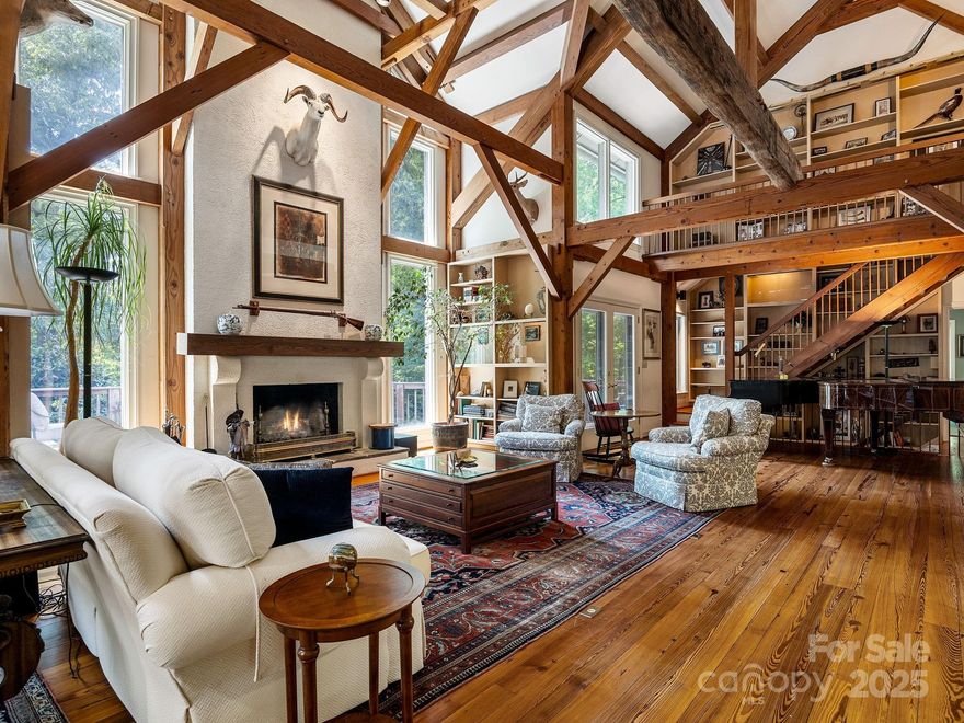 1360 Skunk Hollow Rd- For the buyer who values craftsmanship, privacy, and usable acreage—this is the one.

Tucked into a peaceful, private setting, this 70 ± acre estate pairs a hand-hewn timber-frame home of more than 5,800 square feet with a guest cottage and a large creek-fed pond surrounded by rolling pasture and mature woods. Nearby, an excavated and leveled building site already has electricity in place—providing the infrastructure for future expansion, whether a barn, studio, or other purpose-built space. The seller is open to adjusting the acreage to suit the buyer’s vision.

The main home offers three bedrooms, two baths, multiple fireplaces, generator, and an expansive upstairs with additional rooms and loft space—ideal for offices, guest quarters, or creative use. The guest cottage provides comfortable living space with two bedrooms and one bath, perfect for visitors, rental income, or on-site help.

Every part of the property has been crafted with intention, offering flexibility and enduring quality. Whether you envision a private retreat, working farm, or equestrian property, this land is ready to support it.

A rare opportunity to own a legacy property with the space, quality, and quiet beauty that are hard to find—and even harder to replicate.