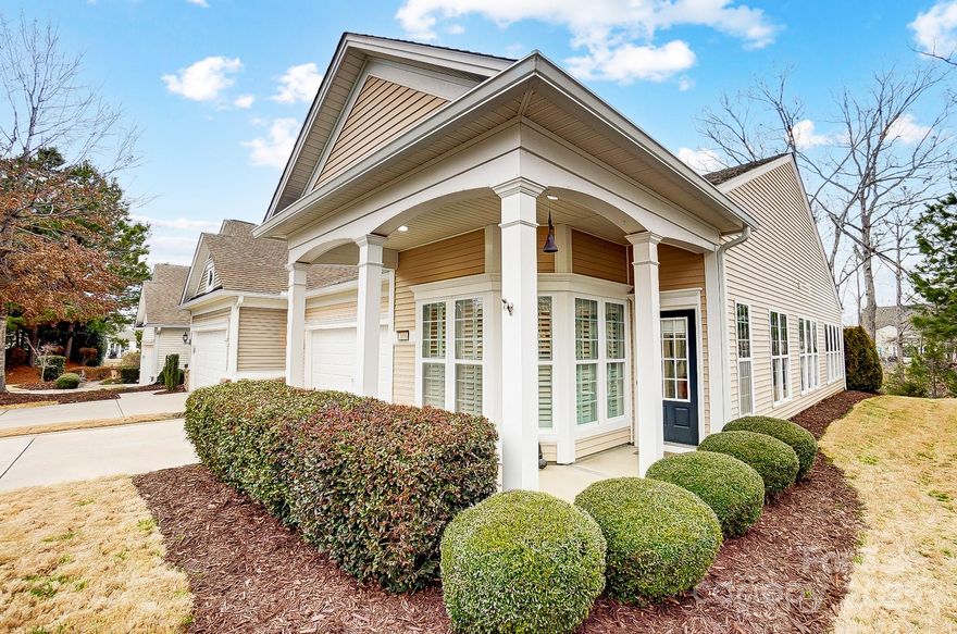 LIMITED OPPORTUNITY! 4th of July sale! Why we love this home: NEW FURNACE! Private view of trees off extended patio w/retractable awning, bamboo & tile floors (no carpet), custom plantation shutters, no through traffic, no pets ever lived in this home, new HVAC 2020, end unit = more natural light! One story, maintenance free living in a community with options for all, come find your people. The only steps in the home are one at each entrance. The layout lends to many opportunities to use the sunroom as an extra den, office or craft area. The kitchen features an eat in area brimming with light and the pass through to the dining room is uber convenient. A large family room suits the needs of many and the primary suite does impress with its size & upgrades. Be sure to see the large primary closet & ensuite. The guest room features it's own bathroom too. Please notice the size & privacy of the front porch. Golf cart outlet in the 2 car garage. Desired active community. This is the one