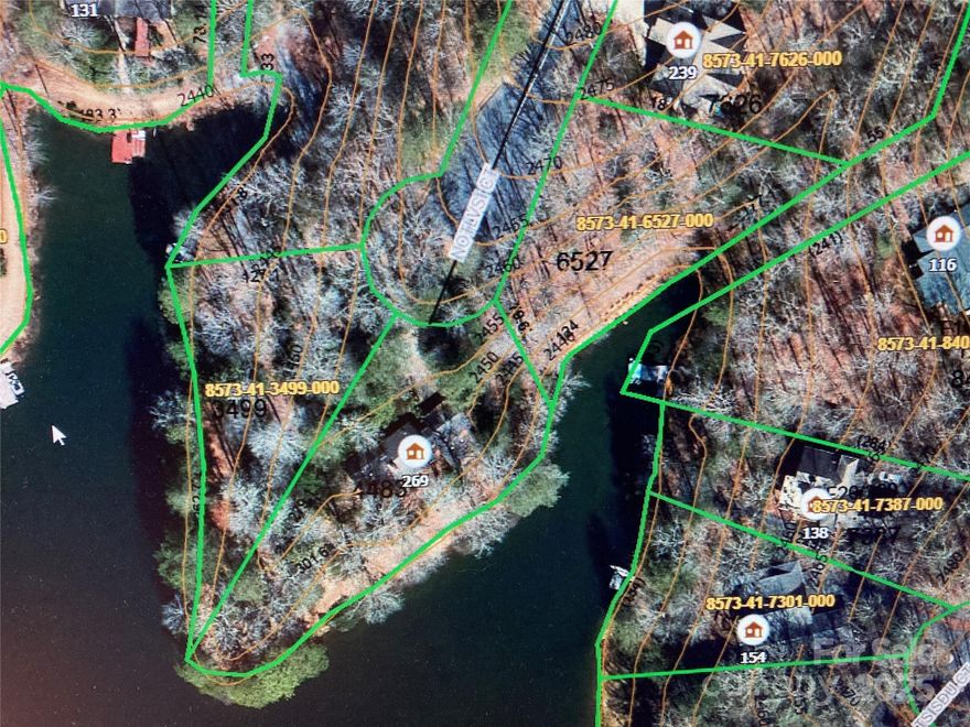 This is a Premier building site in Connestee Falls on Lake Wanteska!  This level lot features year round water views with over 250 feet of lake front and lake level living; no steep slope or steps to worry about!  One of three (3) available lots, it can be combined for a massive estate property on your own private peninsula with over 700 feet of waterfront on three sides.  Lake Wanteska is the cleanest, quietest, and most neighborly of the three larger lakes in Connestee Falls and is largely known for its trout and bass fishing.  Close to the Walnut Grove entrance, it is only minutes into town.  Bring your builder and create the estate lifestyle most peopole can only dream of!