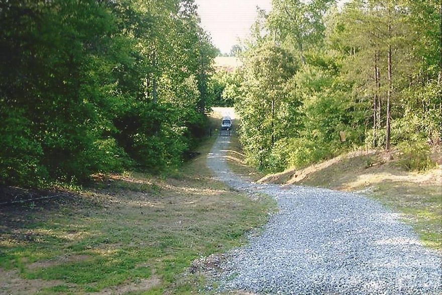 NO HOA's! Welcome to a slice of heaven on Mundy Road, Denver, NC.  These approximate seven acres have wonderful views of mountains, bountiful wildlife and nature; it's a serene paradise in Lincoln County! Nestled in a peaceful country setting, this large private wooded lot gives you an extraordinary opportunity to build your dream home exactly as you envision it.  According to Lincoln County, you can build up to 3 homes on this lot and its mobile home/manufactured home approved. With low Lincoln County taxes, this is the perfect chance to embrace the rural charm of the area without sacrificing modern conveniences and amenities.
