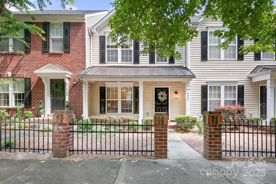 Charming Townhome in a Prime Location! Welcome to this inviting 2-bedroom, 2.5-bath townhome featuring a classic rocking chair front porch over looking a beautiful wooded area. The perfect spot to relax and enjoy the neighborhood vibe. Step inside to find an open-concept kitchen designed for both style and function, complete with granite countertops, stainless steel appliances, and a spacious island ideal for casual dining or entertaining. Located in a popular, walkable community, you’ll love the easy access to neighborhood amenities, scenic walking trails, shopping, and just steps away from a highly rated local restaurant, this home offers the perfect blend of convenience and comfort. With its prime location and modern finishes, this townhome is move in ready and waiting for you!