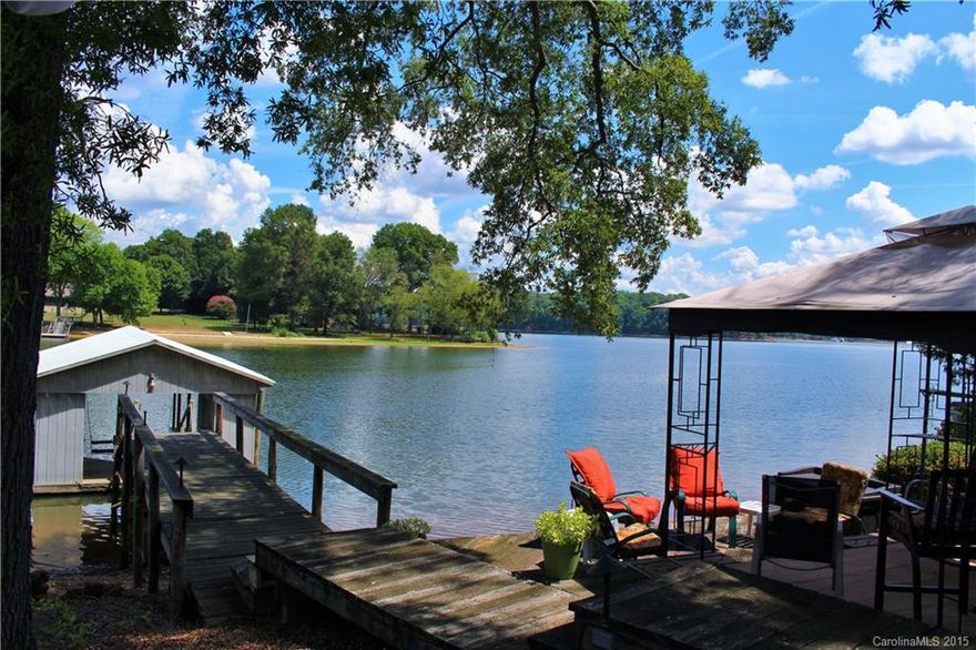 WELCOME HOME to This Waterfront Retreat on Spectacular Deep Water Lot!Set Among Stately Homes in the Desirable Lake Wylie Community of The Coves.Unwind After a Hard Day,Grab Your Tea,a Good Book,Relax & Watch the Beautiful Sunsets from Covered Lakefront Deck!NO Dry-Dock Here-Amazing Main Channel Views!Gentle Slope-Open Flr Pln-Lge Wrap Around Deck-Newer Roof-New 14 Seer Heat Pump- Cov Boat Lift w/Metal Roof-Floating Dock-Jetski Platform/Slip-Fantastic Loc-OH & Did I Mention-NO HOA!No Powerlines!