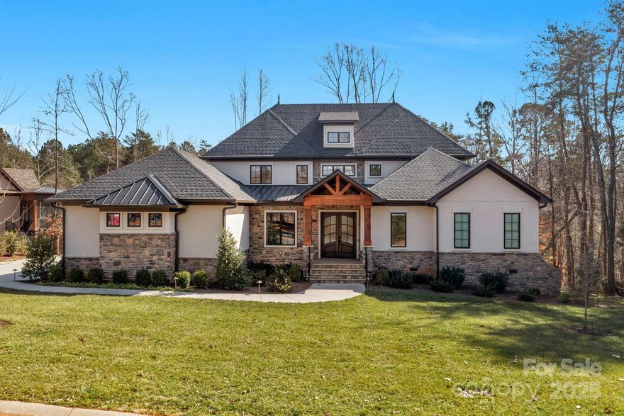 Enjoy views from the covered screened porch, outside deck, or poolside living in this home located in Reflection Pointe! Double door main entrance, den/office with built-in cabinets/French doors, and stunning open floor plan. The great room boasts a two-story vaulted beamed ceiling, fireplace, built-in cabinets, surround sound, ceiling speakers, central vac & custom molding. The kitchen offers a SubZero fridge, double-drawer freezers, wine fridge, S/S Wolf duel fuel range, four burner w/skiliet, Wolf steam oven, large granite island, breakfast seating, cabinet storage, dishwasher, and oversized sink with dual faucets. Don't miss the hidden walk-in pantry & dining area. Large laundry with dog entry and pet shower. Entry level primary bdrm & primary bath with split sinks, room for soak tub, walk-in shower, and walk-in closet. Bedroom #2 entry level w/bath. A wide staircase takes you to an upper walkway to bdrm 3 & 4,both with en-suite baths. WOW! A new pool in 2023 and a fenced backyard.