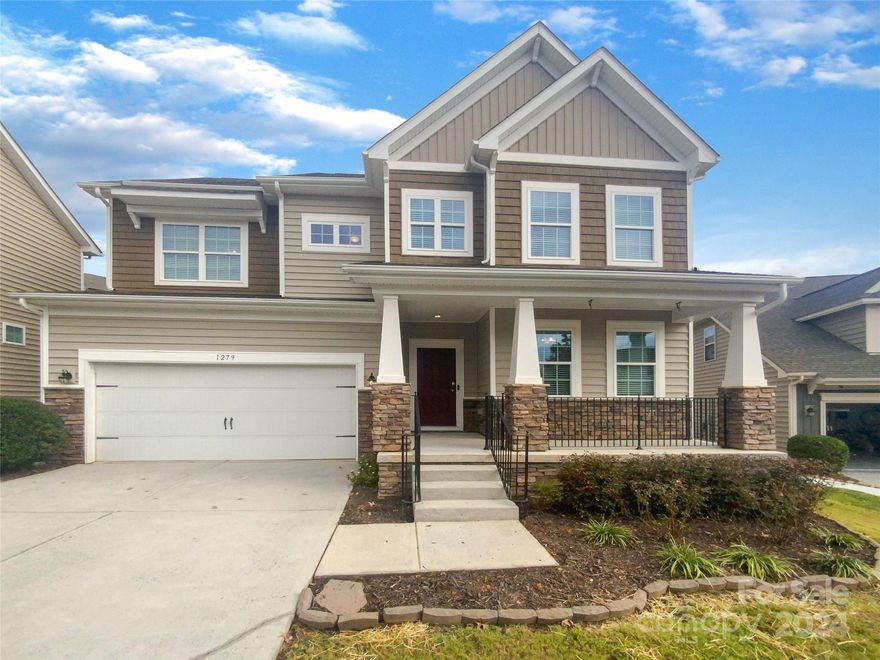 Seller may consider buyer concessions if made in an offer. Welcome to your dream home, where luxury meets comfort. The inviting living room boasts a cozy fireplace for those chilly evenings. The gourmet kitchen has all stainless steel appliances, an accent backsplash, and a convenient kitchen island for meal prep. The primary bathroom features double sinks, a separate tub, and a shower for ultimate relaxation. The primary bedroom comes with a spacious walk-in closet for all your storage needs. Outside, you'll find a deck perfect for entertaining and a fenced-in backyard for added privacy. This property is sure to impress, don't miss out on this gem!