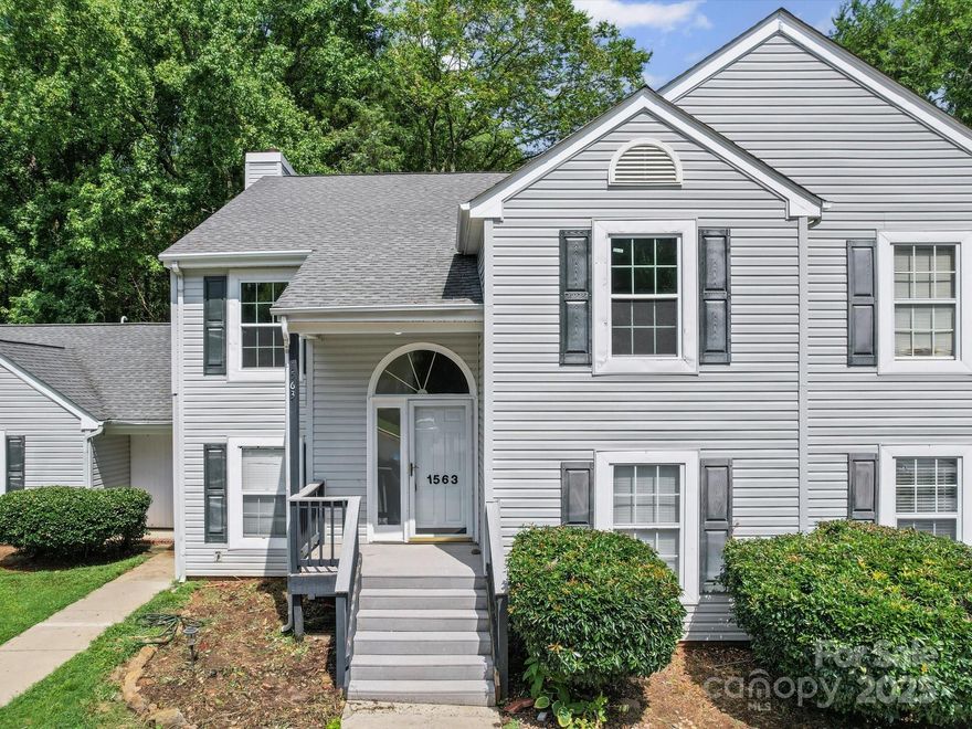 Move-in ready 2BR/2BA villa with 1,133 SF located minutes from I-77. Stunning completely remodeled home on quiet street features open floor plan with seamless flow. Recent updates include luxury vinyl plank flooring throughout, fresh paint, updated lighting, and modern kitchen with quartz counters, stainless appliances, and white cabinetry. Both bedrooms feature beautifully updated ensuite baths with luxury tile, quartz counters and new vanities. Cozy fireplace in living area perfect for entertaining. You'll love the screened porch accessible from both living room and primary bedroom. Close to dining, shopping, and entertainment. Turnkey condition!