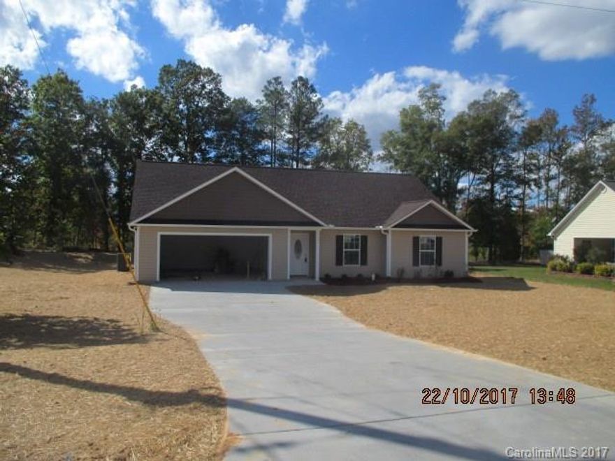 NOT READY YET BUT ALMOST New Construction!!! Beautiful 4 bedrooms and two baths, main bed room bath has double sinks, den/eating/kitchen combination, beautiful soft colors through out the home, stainless steel appliances including refrigerator. Front porch and patio on back, concrete drive and walk way. Grass and plants to be planted as soon as weather permits. Subdivision with NO HOA Wonderful new home for a very reasonable price.