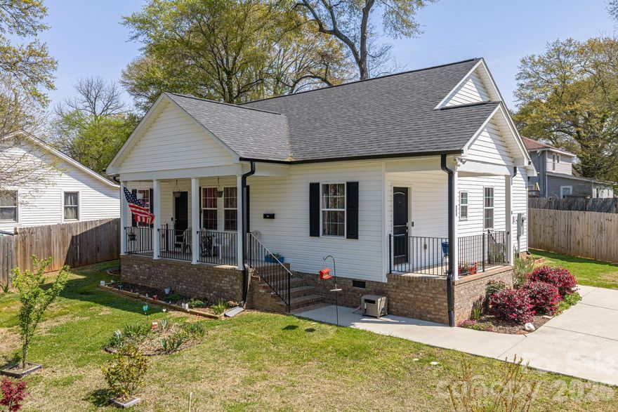 Charming Home Conveniently located near downtown Mount Holly and just minutes from I-85!  This well-maintained 3-bedroom, 2-bath home offers comfortable living with great indoor and outdoor spaces.  Inside, you’ll find a welcoming gathering area with beautiful wood floors throughout the main living spaces. The primary suite features dual vanities, a tub/shower combination, and private access from the rear patio, creating a convenient and relaxing retreat. Secondary bedrooms are generously sized, with carpet in the bedrooms, tile flooring in the bathrooms, and hardwood floors in the living areas.  Enjoy outdoor living with covered front and side porches, perfect for relaxing or visiting with friends and neighbors. The fenced rear yard and patio provide additional space for entertaining, pets, or outdoor activities. Situated on a corner lot with a concrete driveway, this property offers both convenience and charm.  A great opportunity to enjoy comfortable living with easy access to shopping, dining, and major