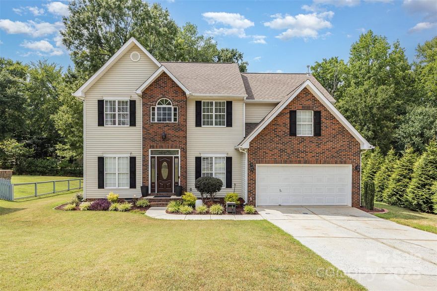 Beautiful, well-maintained home in desirable Covington neighborhood! This quiet cul-de-sac home is a perfect blend of privacy and convenience - just minutes to Hwy 29, I-485 and I-85. With 2319 sq ft, this 3br 2.5 ba home has plenty of flexible living areas to suit your lifestyle. The main floor boasts a beautiful family area with a cozy den and open flex space that's perfect for entertaining, relaxing or setting up your favorite hobbies. Work from home in the dedicated office space. Add to that a bonus room upstairs for playroom, gym or guest retreat. Kitchen features an island, breakfast nook, soft close cabinets and appliances just 2 years old. Step out onto the spacious 10 X 25 ft deck, overlooking a large backyard with mature trees lining the back of the property for added privacy. Additional highlights include a storage shed and a new vapor barrier installed in the crawlspace this year. All this with a community pool, tennis courts and playground. A must see in a great location!