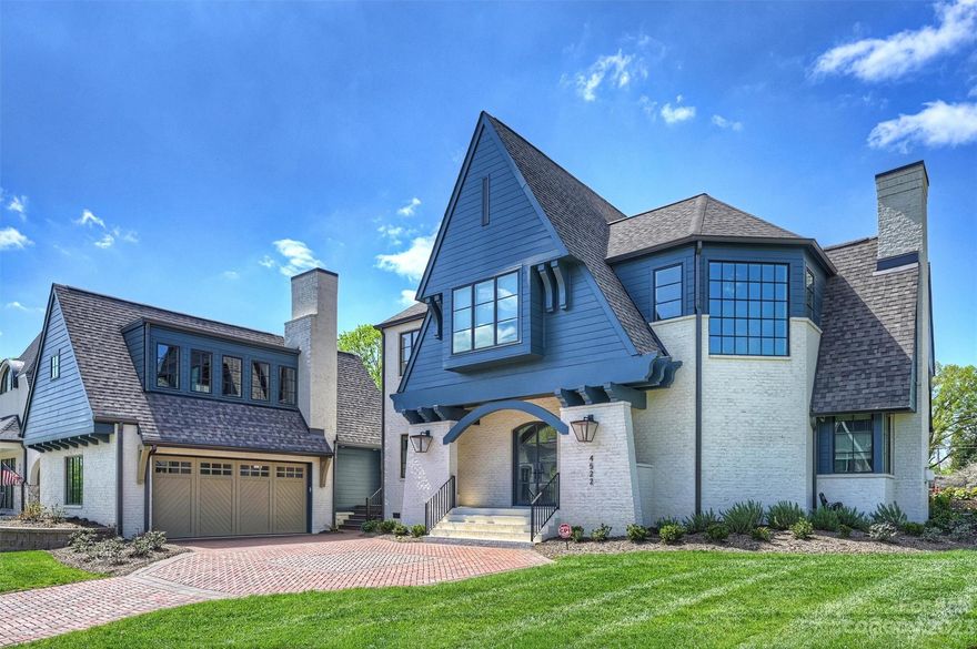 Stunning Grandfather Homes + Mermans Architecture corner lot duet home located in highly sought after Cotswold! Bright, open floor plan is perfect for entertaining with an easy flow between the kitchen, living & dining room - plus two access points to covered outdoor terrace with its own fireplace + TV access & turf area! Chef's kitchen features oversized island, Thermador appliances, plaster range hood & cabinet-to-ceiling backsplash. Spacious first floor flex room perfect for an office or guest suite, complete with its own private bath. Primary suite features shiplap vaulted ceilings, spacious bathroom w/ dual vanity, soaking tub, walk-in shower & oversized closet. A true retreat! Two additional bedrooms & baths + laundry room complete the second floor. Huge two-car garage with unfinished square footage above the garage! Don't miss your opportunity to be a part of this unique, luxury community with all the modern day conveniences you desire!