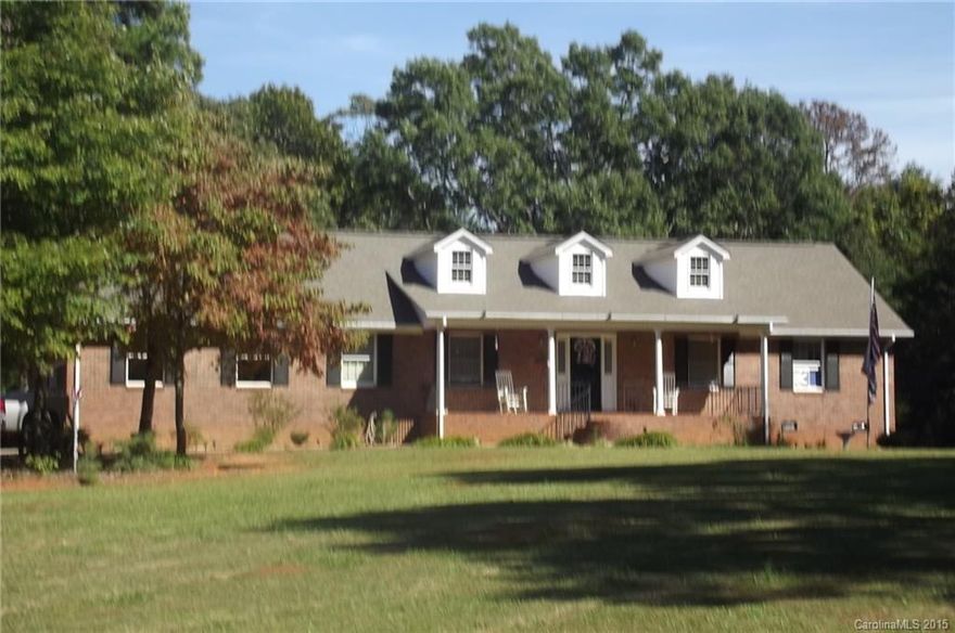 Move in today!  Low maintenance brick ranch with vinyl clad trim.  Excellent hardwood floors throughout except bedrooms. Oversized deck and 4 acres of privacy.